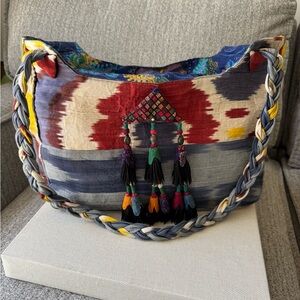 One of a kind global textile handbag